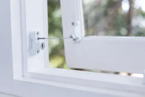Window lock attached to a window